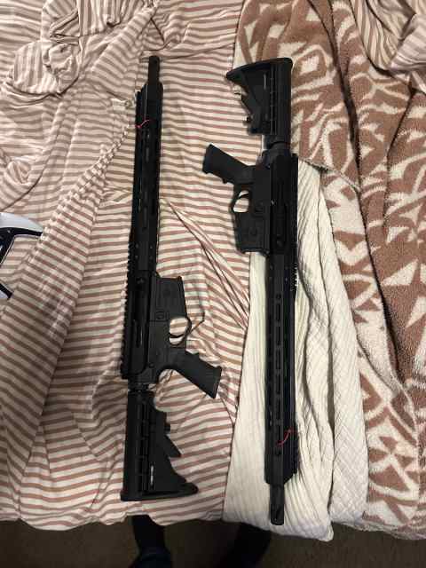 ** 2 BRAND NEW AR 15s**