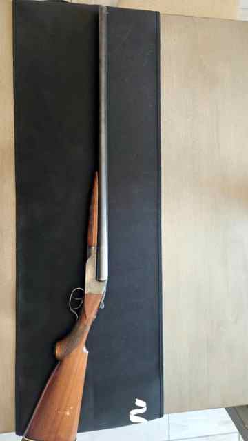 1921 Ithica double barrel shotgun 