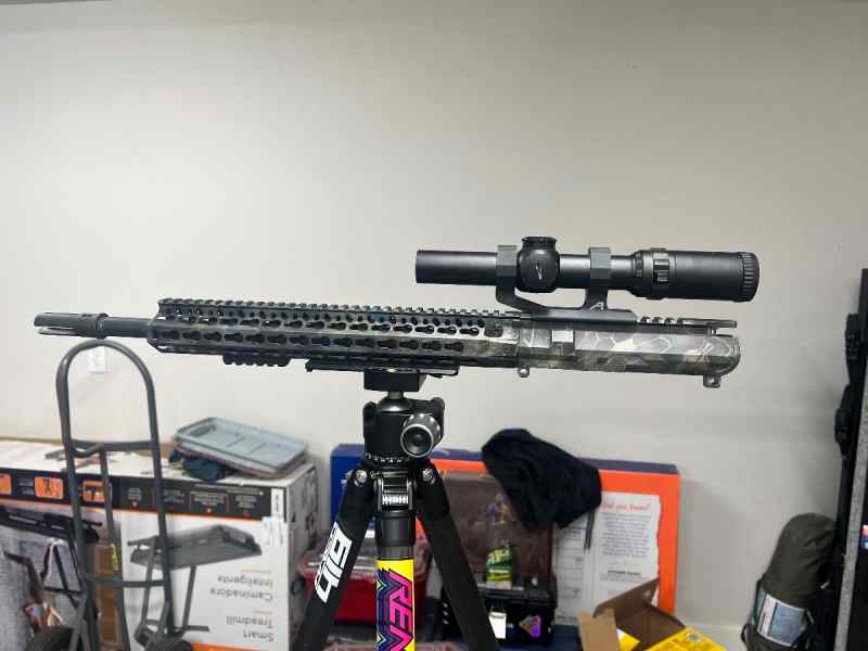 16inch BCM upper with SureFire muzzle device 