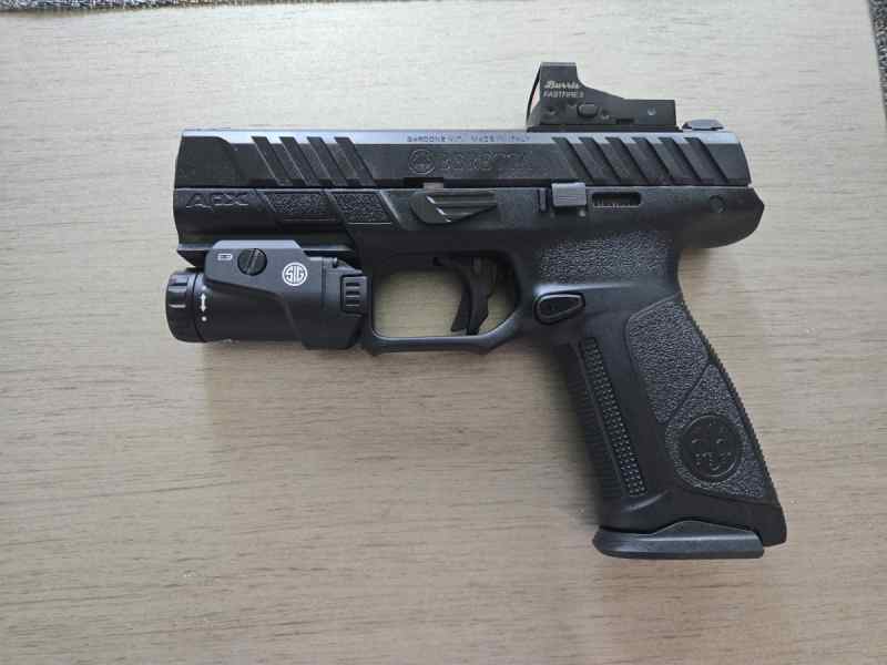 Beretta APX A1 with red dot, flashlight, and ammo