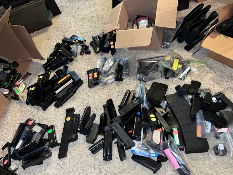 Over 200 various pistol mags